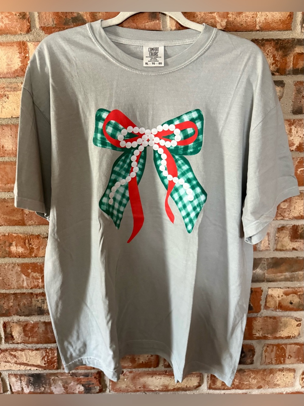 Comfort Colors Bay Tee with Green Gingham & Red Bow Graphic
